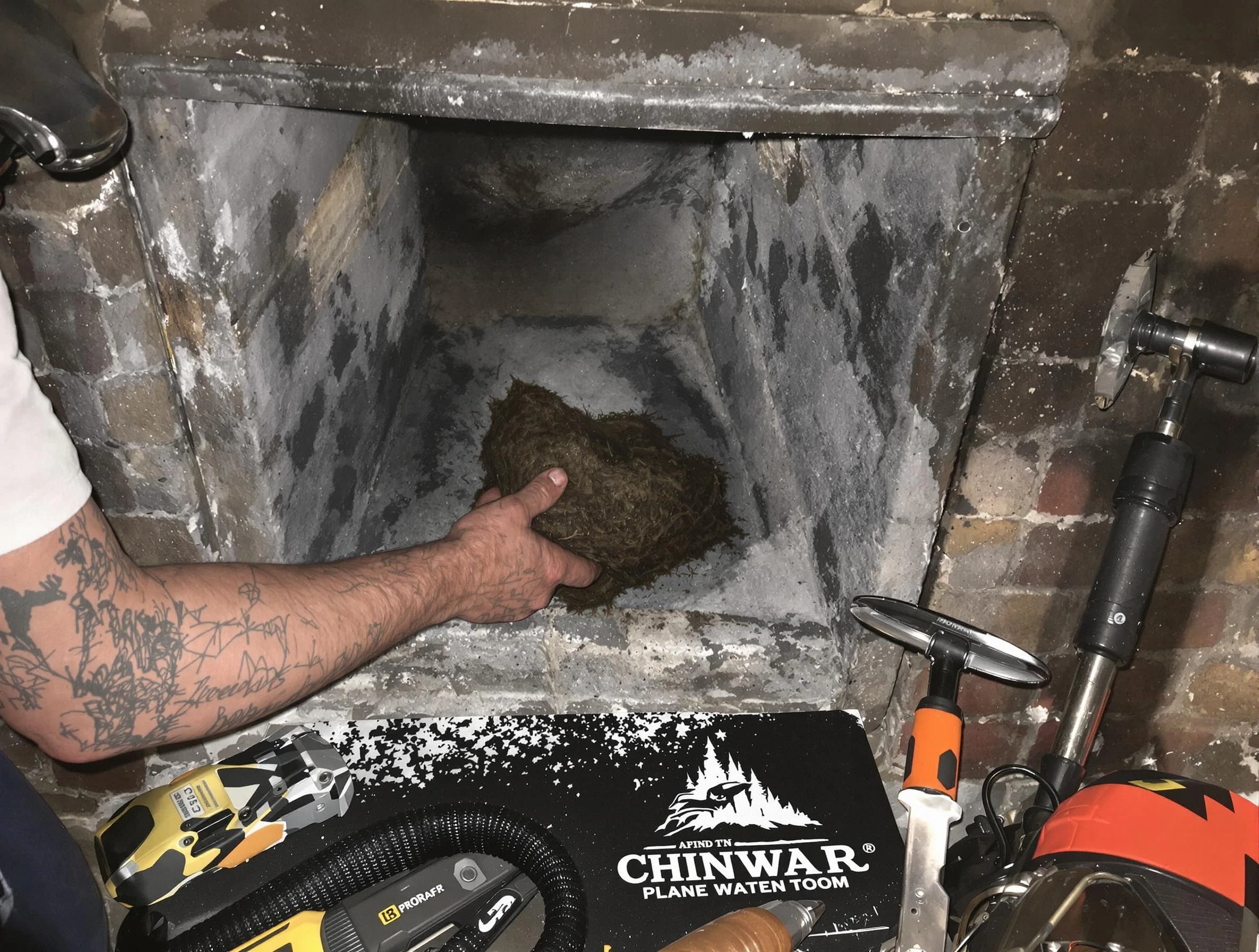 McCalla Chimney Sweep safely removing debris and screening chimney in McCalla, AL